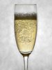 711315-ein-sekt-glas-champagner-auf-einem-grauen-hintergrund.jpg